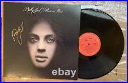 Billy Joel signed Piano Man album. In Very Good Condition. Comes with Vinyl Record