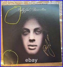 Billy Joel signed Piano Man album. In Very Good Condition. Comes with Vinyl Record