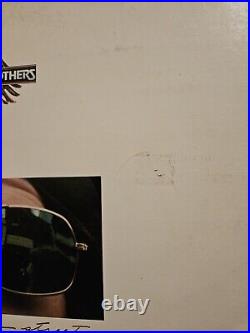 Doobie Brothers Tom Johnston Autographed 1976 Vinyl Album