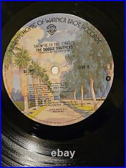 Doobie Brothers Tom Johnston Autographed 1976 Vinyl Album