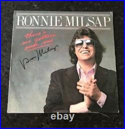 RONNIE MILSAP signed vinyl album THERE'S NO GETTIN OVER ME COA 1